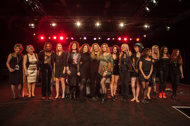 From left: She Rocks Awards winners Debbie Cavalier, Craigie Zildjian, Amani Duncan, Katie Kailus, and Gayle Beacock; She Rocks Awards Founder and Co-Host Laura B. Whitmore; Zepparella drummer Clementine; She Rocks Awards winner and performer Vicki Peterson of The Bangles; guest keyboardist Jenna Paone; She Rocks Awards winner and performer, saxophonist Mindi Abair; Eva Holbrook of SHEL; She Rocks Awards winners and performers Susanna Hoffs and Debbi Peterson of The Bangles; Zepparella bassist Angeline Saris; and Zepparella guitarist Gretchen Menn attend the She Rocks Awards during NAMM at the Anaheim Hilton on January 23, 2015 in Anaheim, California. (Photo by Kevin Graft)